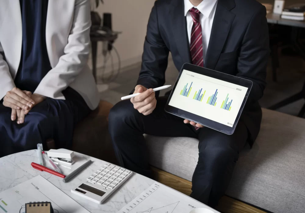 business-people-working-with-ipad-high-angle